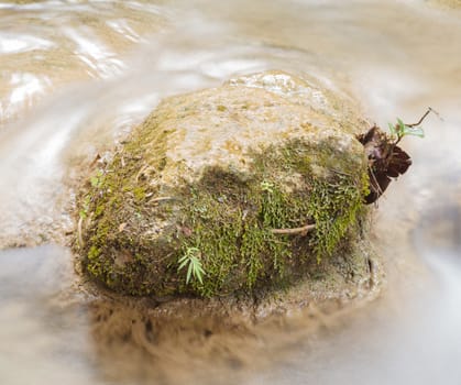 rock in the waterfall