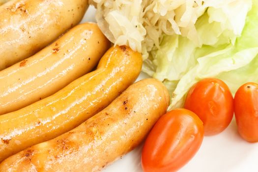Premium pork sausages on a plate