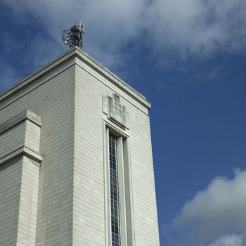 brick building with communication tower on top