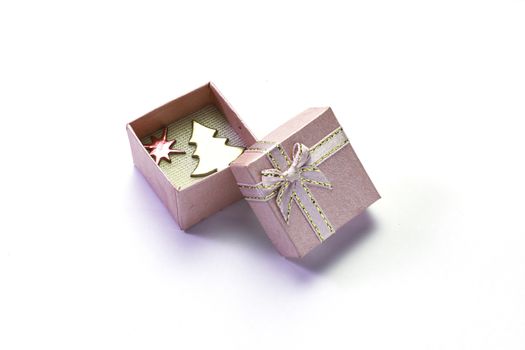 Pink gift box with bow isolated on a white background