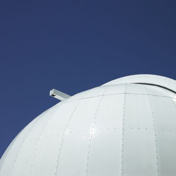 white observatory against the blue sky