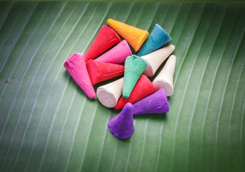 colorful Incense on banana leaf