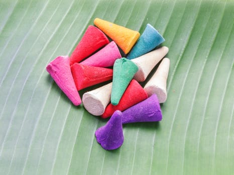 colorful Incense on banana leaf