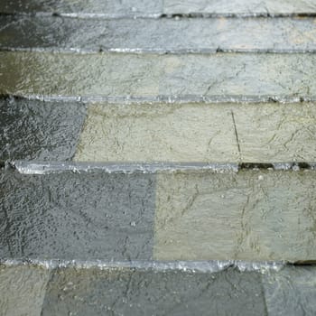 water flowing down on tiles