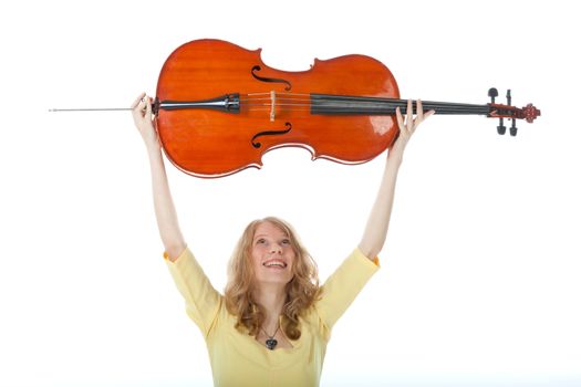 young woman holding cello up in the air and white background
