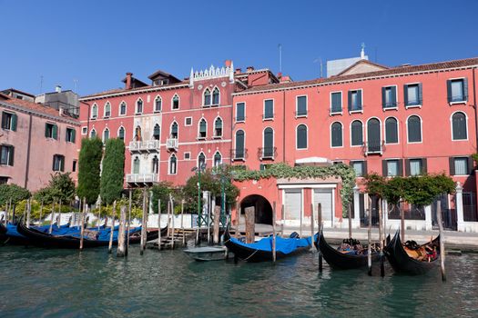 Venice Grand Canal, Italian Canal Grande and gondola small harbor. Old Venetian architecture, boats