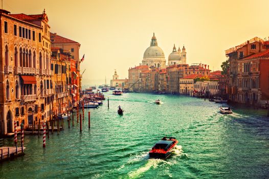 Venice, Italy. Grand Canal and Basilica Santa Maria della Salute at sunset. View from Ponte dell Accademia