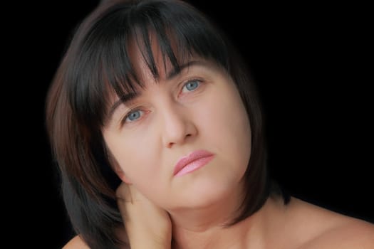 Portrait of woman with blue eyes and black hair