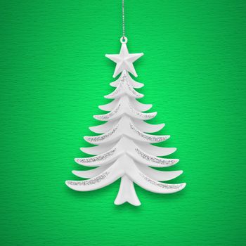 Christmas tree on a background of green paper