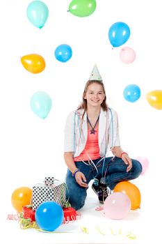 a birthday girl with presents and balloons on a white background