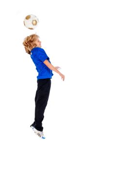 Portrait of a young soccer player heading ball isolated over white background