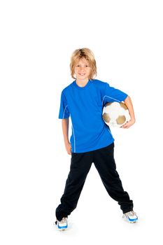 a young boy holding a soccer ball on a white background