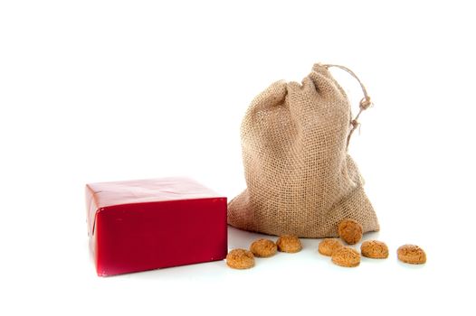 A jute bag full of pepernoten, for celebrating a dutch holiday " Sinterklaas "  on the fifth of December