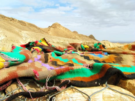 Colorful cloth lying on a background of mountains