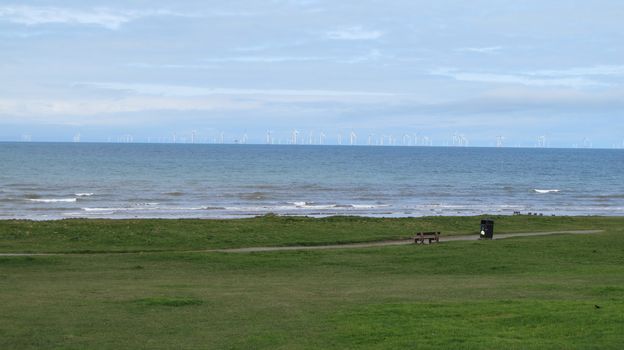 Sea and windfarm at Barrow in Furness Cumbria Uk