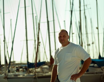 Portrait of a man on a yacht at the yacht club .