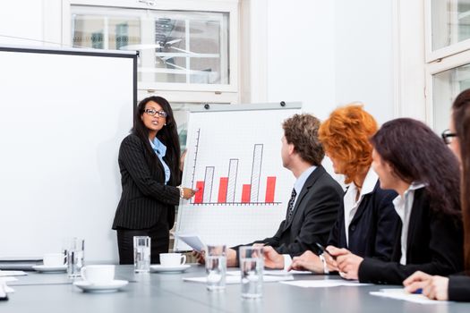 business team on table in office conference seminar presentation