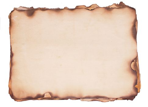 Bundle of several weathered, old papers with fire damaged and burned edges. Isolated on white.