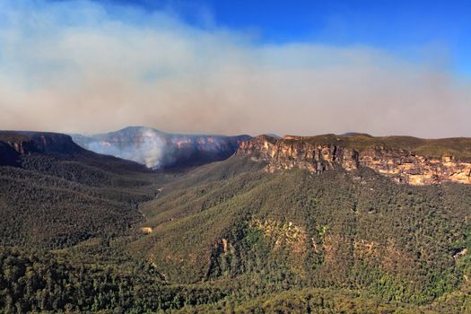 Bushfire in the Grose Valley, B lue Mountains, Australia has threatened towns on the escarpment.  The fireedge is around 66kms with access into valley via trails.  The Valley is over 600-1000m deep..  View from Blackheath