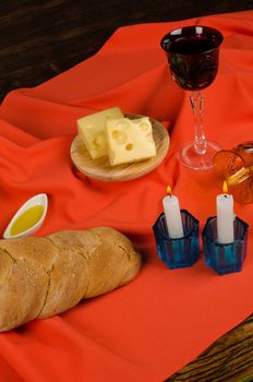 Traditional homemade challah bread in a festive setting