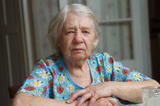 Senior woman portrait of a 88 year old lady 