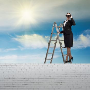 businesswoman climbed a ladder and looking through binoculars