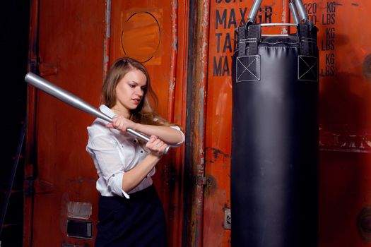 Angry businesswoman with boxing gloves