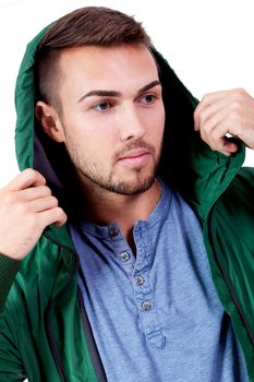 young adult man with green jacket portrait isolated on white