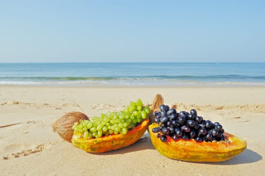 Exotic tropical fruit on the sandy beach