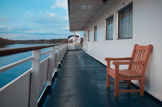 Wooden chair on the deck of the cruise liner