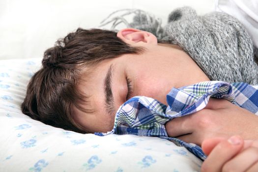 Sick Young Man sleeps with Hanky closeup