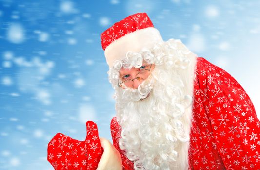 Happy Santa Claus on the Abstract Winter Background