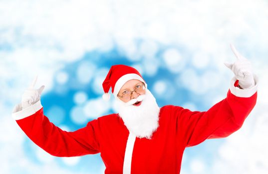 Cheerful Santa Claus with Hands Up on the Abstract Winter Background