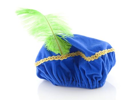 Blue hat with green feather of Zwarte Piet isolated on white background