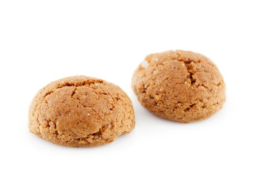 Typical Dutch candy (pepernoten) in closeup over white background