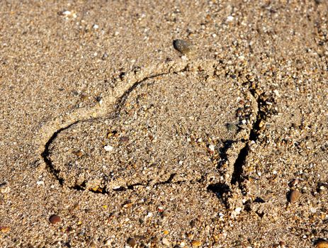 Heart on the beach in closeup