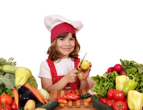 little girl cook peeling potatoes 