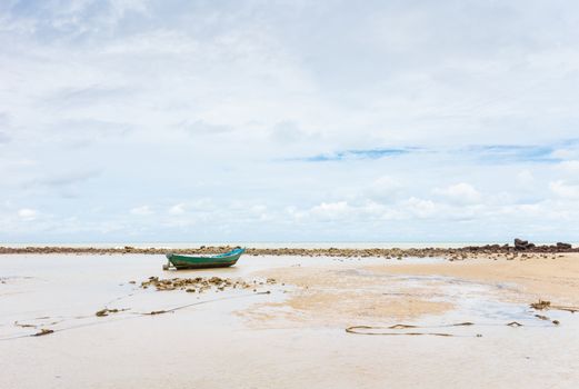 Old fishing boat on the beach