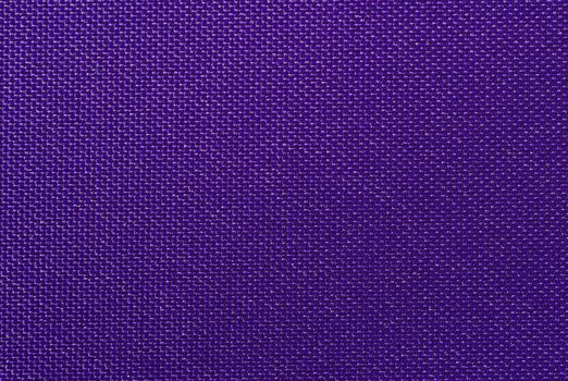 Weaved textile background on violet base