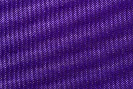 Weaved textile background on violet base