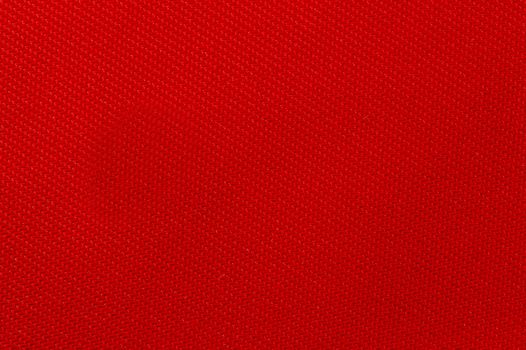 Weaved textile background on red base