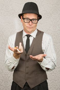 Indifferent European businessman with cigarette and open hands
