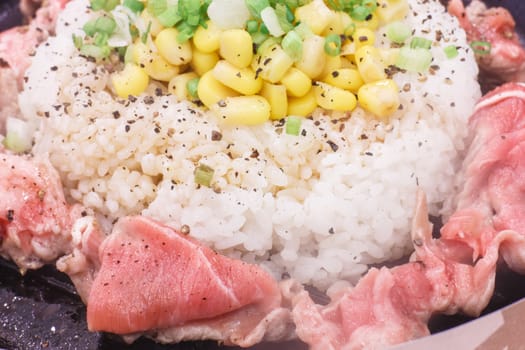 rice and beef on hot plate