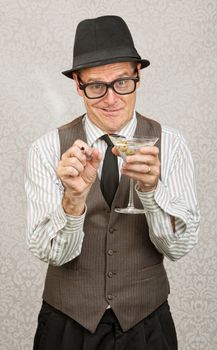 Goofy Caucasian businessman with alcohol and cigarette