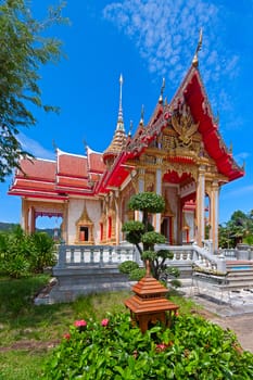 Beautiful Buddhist temple on  background of blue sky, Thailand.