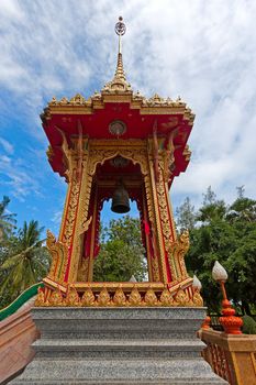 Beautiful bell tower on  territory of  Buddhist temple, Thailand.