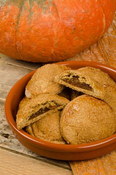 Homemade pumpkin pastry  next to its main ingredient