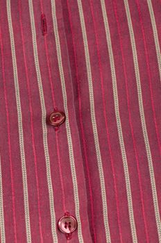 Striped cotton fabric with buttons and buttonholes