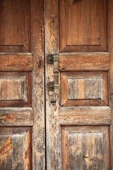 the Closed old entrance wooden door