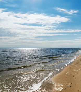 sea in autumn and clouds with sun